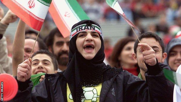 A female Iranian fan watches her team take on the USA, in the 2000 friendly match played in Pasadena